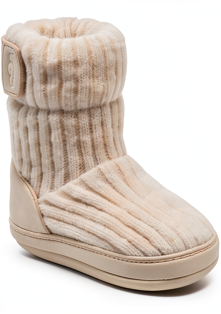 UGG baby slippers in Grey color on a soft surface