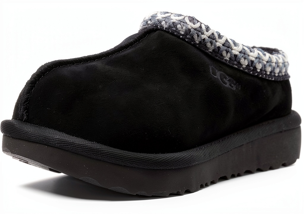 UGG Kids Slippers in Chestnut color shown on child's feet in home setting